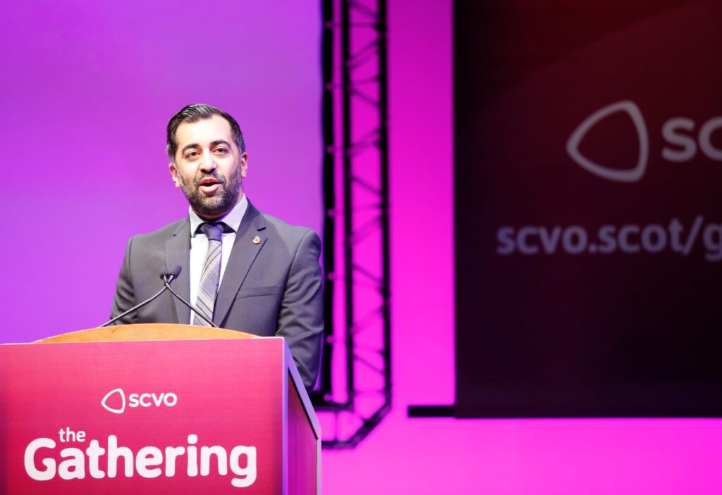 First Minister Humza Yousaf delivers a speech on stage at the Gathering 2023